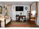Cozy living room with hardwood floors, comfortable seating, and stylish decor at 3151 Wellington Dr, Holiday, FL 34691