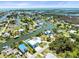 Beautiful aerial view of homes on canals, showcasing waterfront living with docks and boat access at 4104 Pine Dale Ct, Hernando Beach, FL 34607