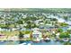 Aerial view of the waterfront home featuring a boat dock in Hernando Beach, Florida, close to Weeki Wachee Preserve at 4469 Bahama Dr, Hernando Beach, FL 34607