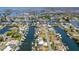 Wide aerial view of homes in the area, with the subject property nestled amongst canals with direct access to the Gulf of Mexico at 4469 Bahama Dr, Hernando Beach, FL 34607