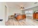 Bedroom with hardwood floors, a large window, and classic furnishings at 4469 Bahama Dr, Hernando Beach, FL 34607