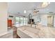 Kitchen island with a farm sink, granite countertops, and stainless steel appliances and water views at 4469 Bahama Dr, Hernando Beach, FL 34607