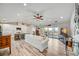 Open living room with water views, and seamless flow to the gourmet kitchen with central island at 4469 Bahama Dr, Hernando Beach, FL 34607