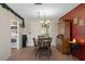 Cozy dining area with tile flooring, and natural light from sliding glass doors at 4537 Cynthia Ln, Spring Hill, FL 34606