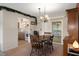 Charming dining room featuring wood table and chairs next to the kitchen at 4537 Cynthia Ln, Spring Hill, FL 34606