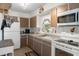 Functional kitchen with white appliances and ample counter space at 4537 Cynthia Ln, Spring Hill, FL 34606