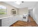 Modern kitchen features white cabinets and appliances at 507 Jewel St, Brooksville, FL 34601