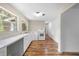 Well-lit kitchen with clean white cabinets and a view from the window at 507 Jewel St, Brooksville, FL 34601