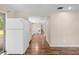 Open kitchen with view into an extended living area at 507 Jewel St, Brooksville, FL 34601