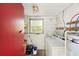 Small laundry room with window and utility sink at 507 Jewel St, Brooksville, FL 34601