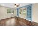 Empty living room boasts natural light and hardwood floors at 507 Jewel St, Brooksville, FL 34601