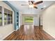 Living room with open floor plan and light-filled windows at 507 Jewel St, Brooksville, FL 34601