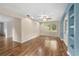 Spacious living room has a ceiling fan and hardwood floors at 507 Jewel St, Brooksville, FL 34601