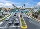 Scenic entrance to New Port Richey's historic downtown, featuring palm-lined streets under sunny skies at 5440 Manatee Point Drive, New Port Richey, FL 34652