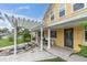 The exterior of the home features a pergola, fountain and water view at 5440 Manatee Point Drive, New Port Richey, FL 34652