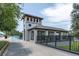 Striking pavilion with dark roofing and black railing with the words New Port Richey at the top at 5440 Manatee Point Drive, New Port Richey, FL 34652