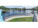 Scenic waterfront showcasing lush greenery, docks and tranquil waterway views at 5440 Manatee Point Drive, New Port Richey, FL 34652