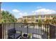 Relaxing balcony with seating overlooking the beautiful complex at 5520 White Marlin Ct, New Port Richey, FL 34652