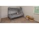 Bedroom featuring a bunk bed, carpet, and decor at 5520 White Marlin Ct, New Port Richey, FL 34652