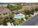 Aerial view of the community pool and recreation area at 5520 White Marlin Ct, New Port Richey, FL 34652
