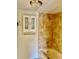 Bathroom featuring tiled shower/tub, vanity cabinet, and frosted glass storage cabinet at 6462 92Nd N Pl # 806, Pinellas Park, FL 33782
