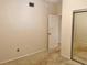 Clean bedroom with neutral carpet, a closet with sliding doors, and white trim throughout at 6462 92Nd N Pl # 806, Pinellas Park, FL 33782