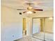 A view of the bedroom, bathroom, and mirrored closet at 6462 92Nd N Pl # 806, Pinellas Park, FL 33782