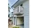 Exterior view of home featuring a garage and balcony at 6462 92Nd N Pl # 806, Pinellas Park, FL 33782
