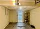 Open garage with access door and laundry room, good storage and organization at 6462 92Nd N Pl # 806, Pinellas Park, FL 33782