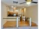 Living room showcasing hardwood floors and a ceiling fan at 6462 92Nd N Pl # 806, Pinellas Park, FL 33782