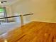 Living room featuring hardwood floors and carpeted area at 6462 92Nd N Pl # 806, Pinellas Park, FL 33782
