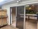A shot of the rear wooden patio and entrance into the house at 6462 92Nd N Pl # 806, Pinellas Park, FL 33782