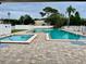 Resort-style pool and spa offer relaxation with lush greenery and ample lounging at 6462 92Nd N Pl # 806, Pinellas Park, FL 33782