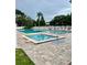 Enjoy the pool and spa with stylish patio and well-manicured greenery at 6462 92Nd N Pl # 806, Pinellas Park, FL 33782