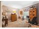 Comfortable bedroom with wood furniture, carpeting, and ample storage space at 6505 Broadwing Ct, Tampa, FL 33625