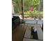 Inviting outdoor screened patio with comfortable seating and views of the lush surroundings at 6505 Broadwing Ct, Tampa, FL 33625