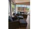 Cozy screened lanai with comfortable seating, perfect for enjoying the outdoors at 6505 Broadwing Ct, Tampa, FL 33625