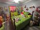 Charming bedroom decorated for the holidays with vibrant, festive accents at 717 Whiteway Dr, Brooksville, FL 34601