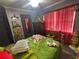 Cozy bedroom with festive decor and ample natural light at 717 Whiteway Dr, Brooksville, FL 34601