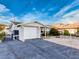 Charming one-story home featuring a one car garage and low maintenance yard at 7303 Hatteras Dr, Hudson, FL 34667