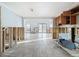 Spacious kitchen with tile floors, wooden cabinets and views to the outside at 7303 Hatteras Dr, Hudson, FL 34667
