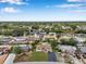 Beautiful single-Gathering home in a quiet neighborhood, featuring well-maintained lawns and mature trees at 7316 Tangelo Ave, Port Richey, FL 34668