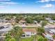 Nestled among mature trees, this single-Gathering home has a large, fenced yard and a private driveway at 7316 Tangelo Ave, Port Richey, FL 34668