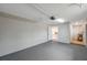 Spacious garage with freshly painted walls and door to home at 7316 Tangelo Ave, Port Richey, FL 34668