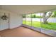 Screened porch provides lovely views of the spacious backyard at 7316 Tangelo Ave, Port Richey, FL 34668