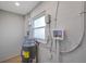 Modern water heater set up inside of the utility room at 7316 Tangelo Ave, Port Richey, FL 34668