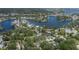 Expansive aerial view of waterfront community highlighting interconnected waterways and lush landscaping at 7424 Grand Blvd, New Port Richey, FL 34652