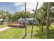 Inviting home with a large wooden deck, perfect for outdoor relaxation and entertaining at 7424 Grand Blvd, New Port Richey, FL 34652