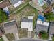 Aerial view of a single-Gathering home with a modest lot and backyard at 7608 Dale Dr, Port Richey, FL 34668