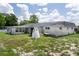 Backyard with sun room attached at 7608 Dale Dr, Port Richey, FL 34668